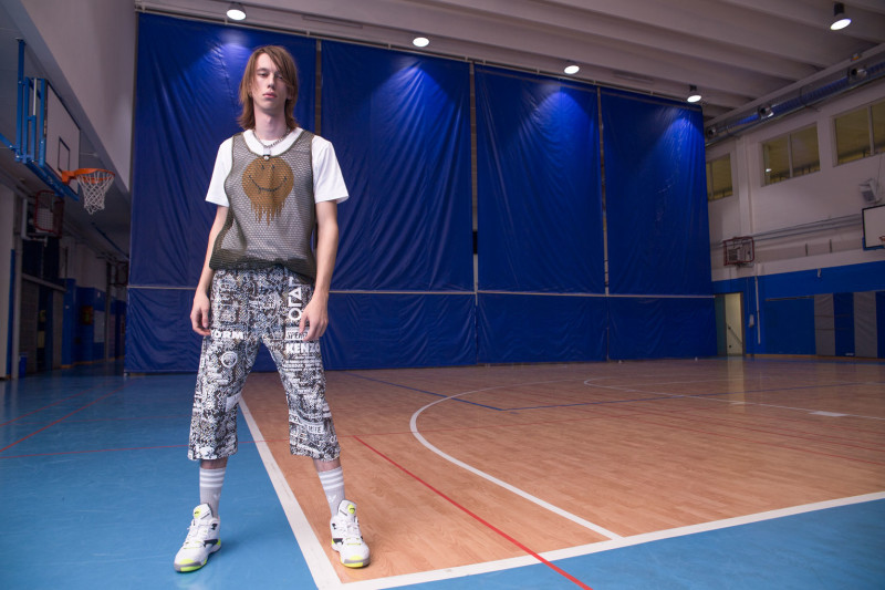 DANCING IN THE EYE OF THE HURRICANE ph. Lorenzo Marcucci for Collectible DRY Armand wears net tank top Les Hommes, printed t-shirt Coach, printed cotton pants with belt, Kenzo, necklace stylist’s own.