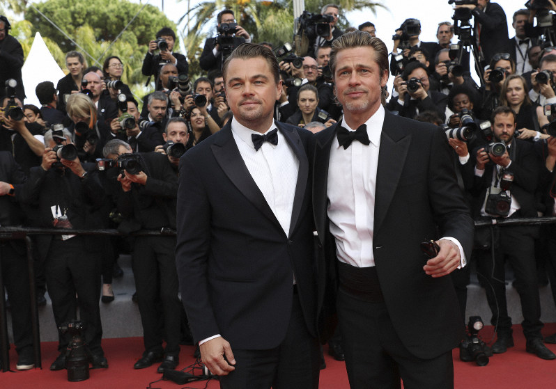 Leonardo Di Caprio and Brad Pitt on Cannes Film Festival's red carpet, Photo by Vianney Le Caer/Invision/AP