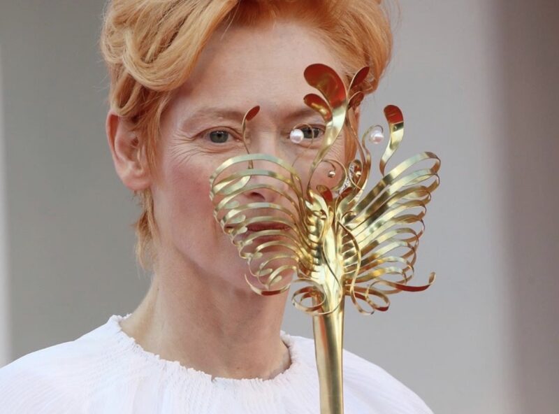Tilda and Stacy_Venice Film Festival 2020_77 edition_premieres_Tilda Swinton_actress_Leone d'Oro prize_winner_Chanel dress_godeln Venetian mask