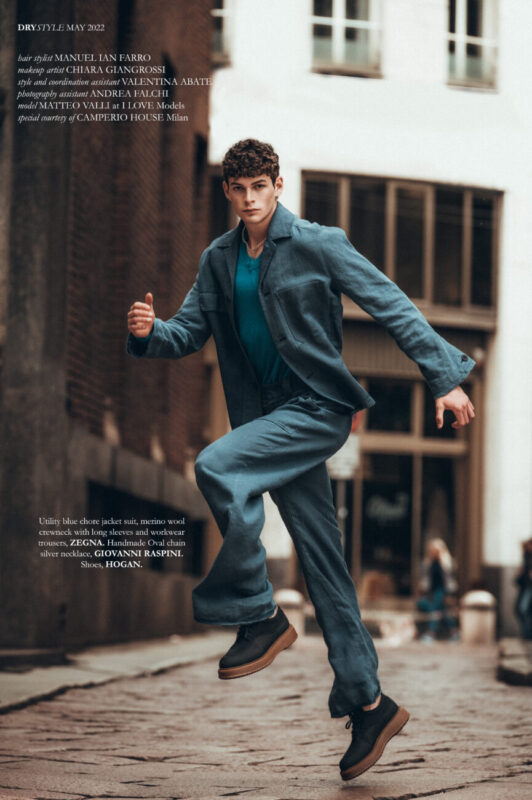 Utility blue chore jacket suit, merino wool crewneck with long sleeves and workwear trousers, ZEGNA. Handmade Oval chain silver necklace, GIOVANNI RASPINI. Shoes, HOGAN. YGU